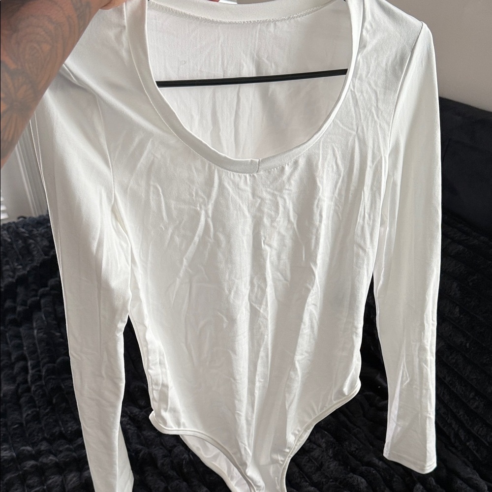 Elegant White Long Sleeve Bodysuit